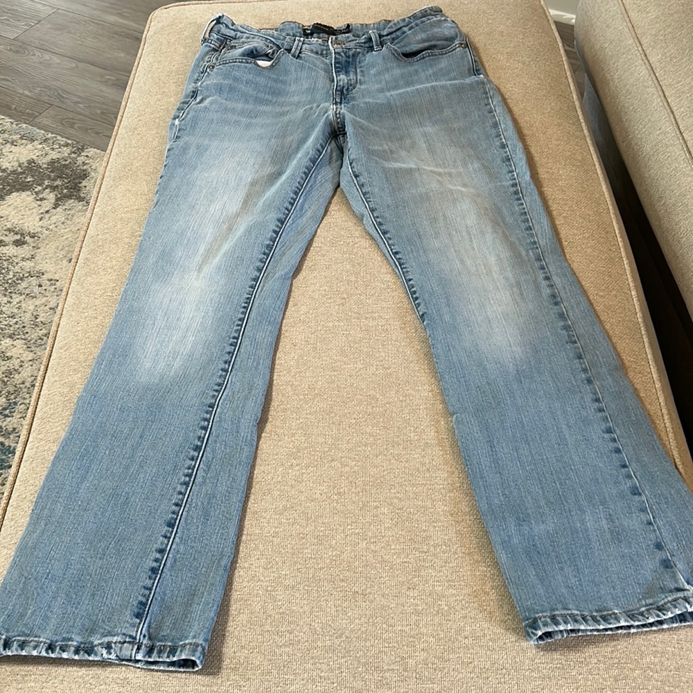 Levi’s, light wash boot cut jeans